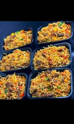 Five meal-prep bowls portioned and ready for the week